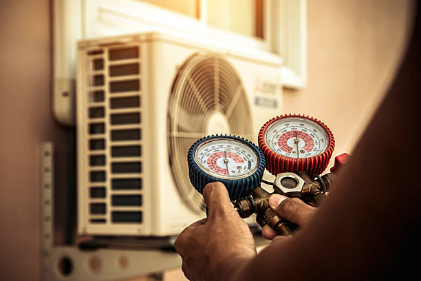 Professional Hvac technician working in Millington, TN
